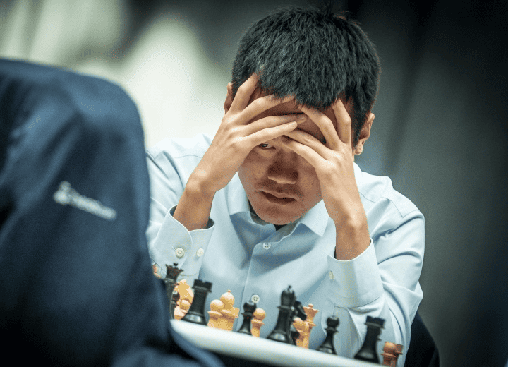 Ding Liren thinking about a chess position