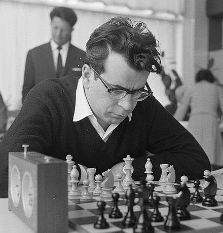 Pal Benko at a chessboard