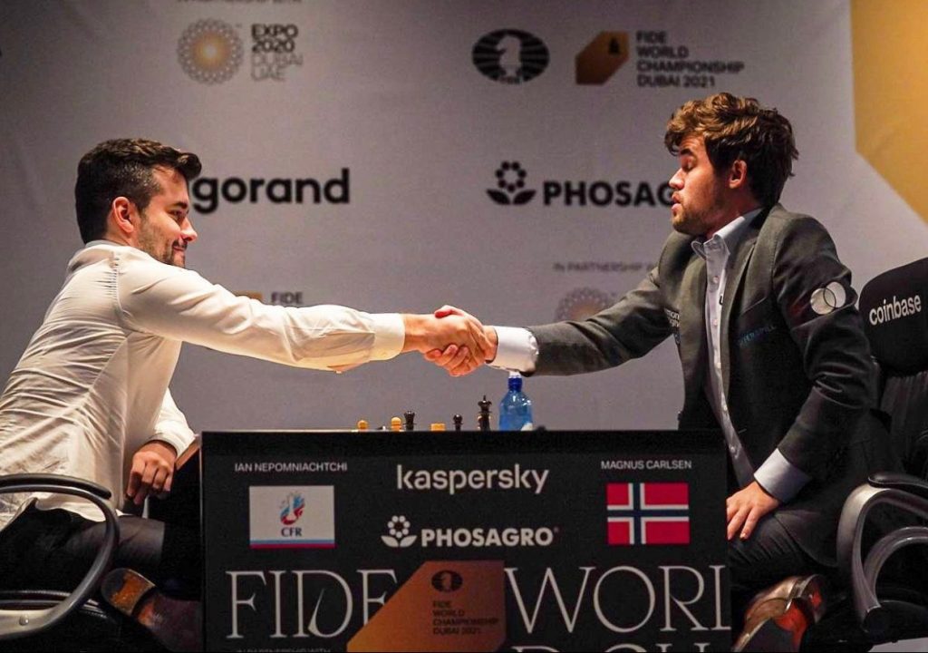 Magnus Carlsen and Ian Nepomniachtchi have the final handshake in the 2021 FIDE World Chess Championship