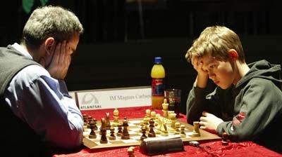 Magnus Carlsen: From Prodigy to Chess World Champion 3 Garry Kasparov playing against a young Magnus Carlsen